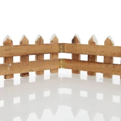 Short Snow Capped Natural Wooden Picket Fence Store