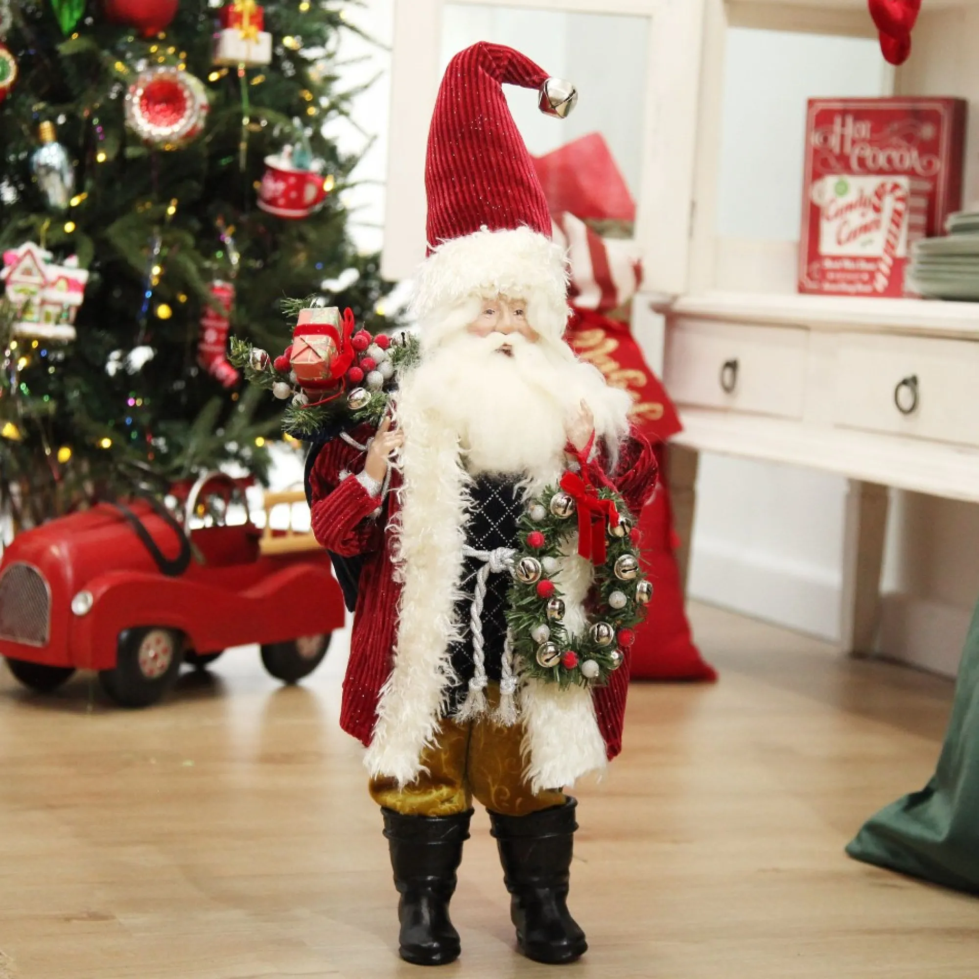 Traditional Santa holding Wreath Christmas Figurine Shop