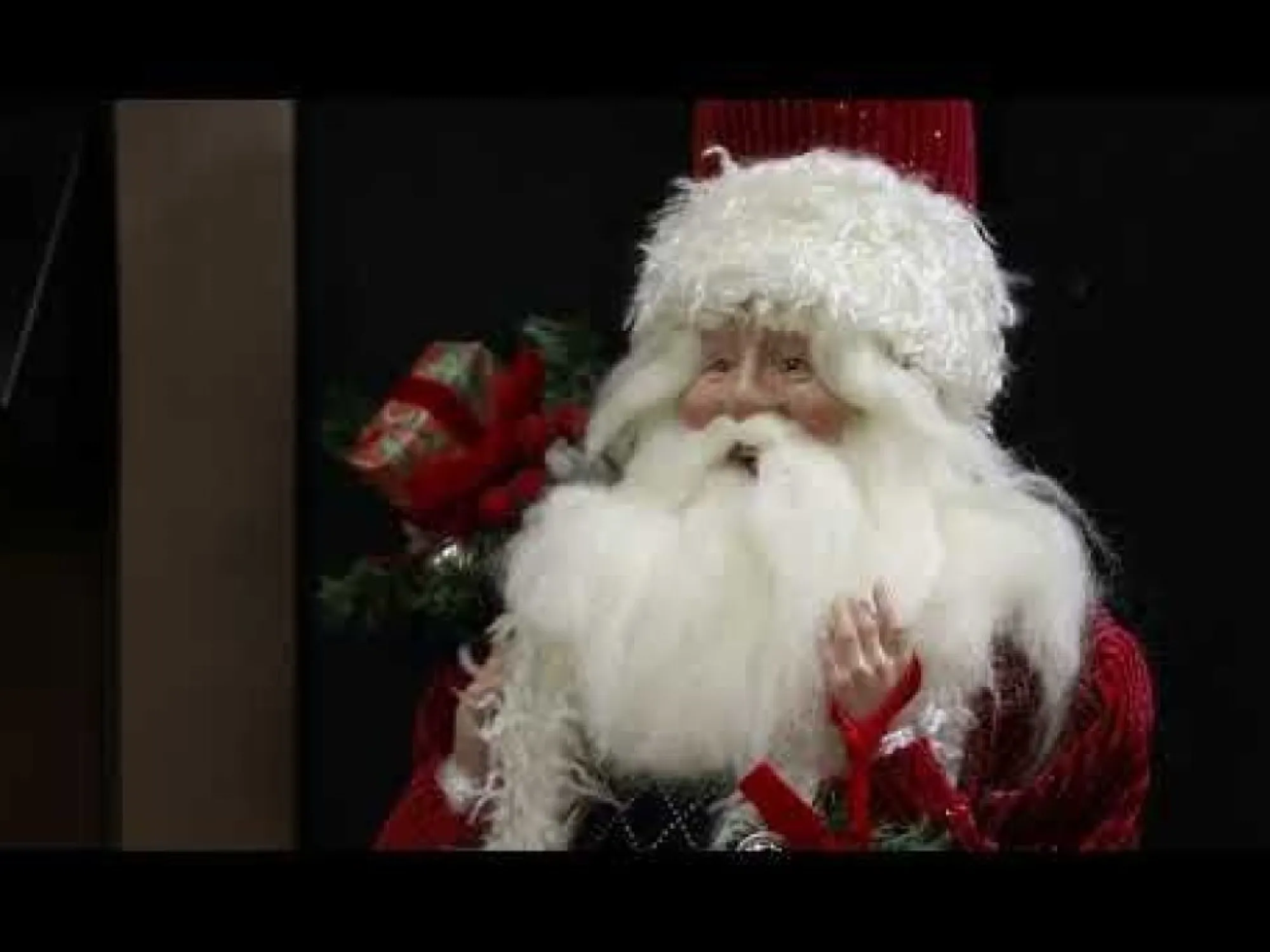 Traditional Santa holding Wreath Christmas Figurine Shop